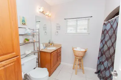 a bathroom with a toilet and a sink at Palms A4 Studio in Panama City Beach