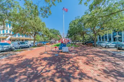 a park with a kite in the middle of a street at 30A Hideaway l Ocean Views l Across street from beach l Rosemary Beach in Inlet Beach