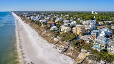 an aerial view of a beach with houses and condos at Summer Wind l Ocean Views, Steps to Beach, Private Pool and Jacuzzi, Golf Cart, Bikes, Ample Parking in Seagrove Beach