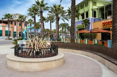 a statue of baseball bats in a basket on a city street at Blue Lagoon (3/2.5) in Panama City Beach