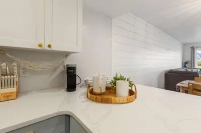 a kitchen counter with a tray with candles on it at Edgewater Resort Villa Beach, Pools,Golf in Panama City Beach