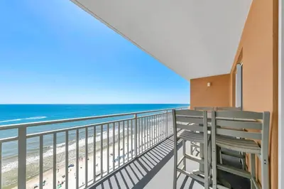 a balcony with a view of the beach at Beachfront Condo in Panama City Beach! in Panama City Beach
