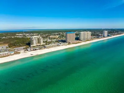 an aerial view of a beach with buildings and the ocean at Origin 0417 - Partial Gulf View on the Pool Desk! in Panama City Beach