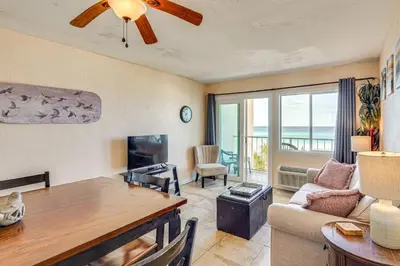 a living room with a couch and a table at Prime Beach Access and Gulf-View Balcony! PBC Condo in Panama City Beach