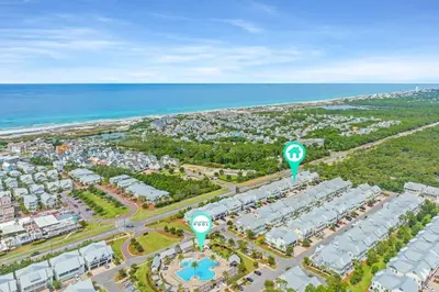 an aerial view of a resort near the ocean at Golf Cart Included - Beach - Pool - Pet Friendly in Santa Rosa Beach