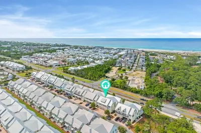 an aerial view of a city with houses and the ocean at Golf Cart Included - Beach - Pool - Pet Friendly in Santa Rosa Beach