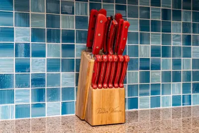 a group of knives in a knife block on a wall at Spacious 3BD 2BA Beach Retreat! 5 Pool Resort! by Dolce Vita Getaways PCB in Panama City Beach