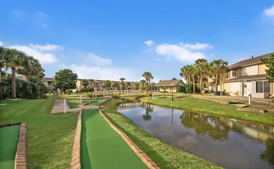 a view of a river with palm trees at Coastal Getaway! Walk to Beach! Pools & Tennis! Pet Friendly! by Dolce Vita Getaways PCB in Panama City Beach
