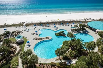 an aerial view of a resort pool and the beach at Your Paradise Awaits! in Panama City Beach