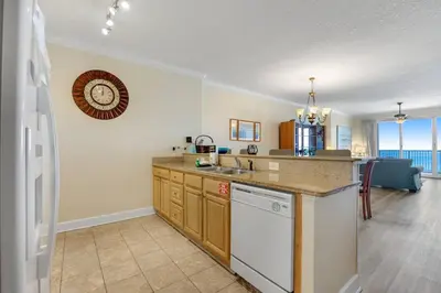 a kitchen with a sink and a counter top at Ocean Reef Starfish in Panama City Beach