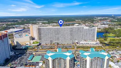 an aerial view of a large hotel building at Sea Turtle at Laketown Wharf in Panama City Beach