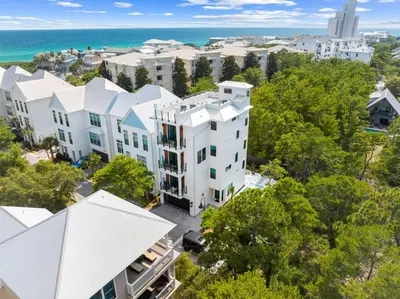 an aerial view of a white apartment building at Endless Views 30A in Santa Rosa Beach