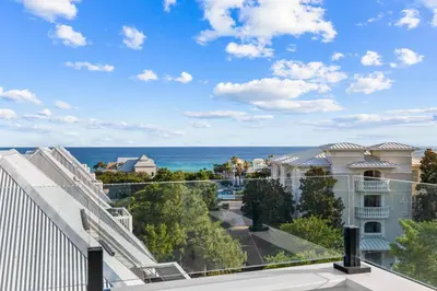 a view of the ocean from the balcony of a building at Endless Views 30A in Santa Rosa Beach