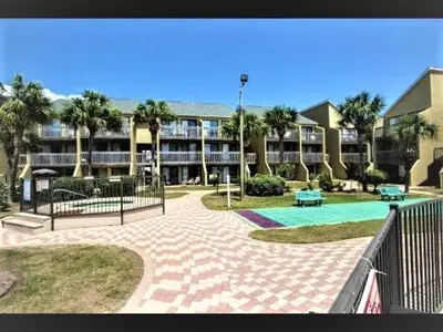 a resort with a swimming pool and a building at Largo Dream at Largo Mar in Panama City Beach