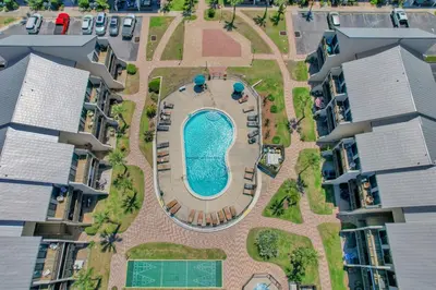 an aerial view of an apartment complex with a swimming pool at Largo Dream at Largo Mar in Panama City Beach