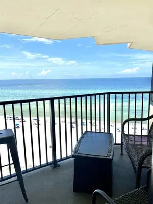 a balcony with a view of the beach at Amazing View Beach Front King Bed in Panama City Beach