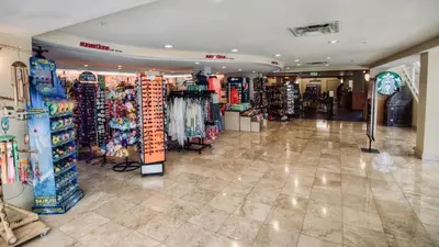 a store aisle with a lot of shops in a mall at Cheap Getaway, Ocean View, PCB in Panama City Beach