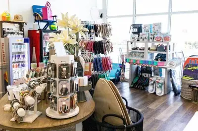 a shop with a sewing machine on a table at Gulf-View Condo with Pool, Grill, Gym & Beachfront Resort Perks! in Panama City Beach