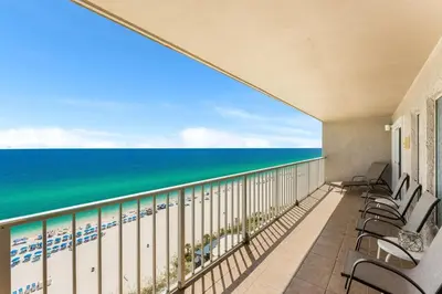 a balcony with a view of the beach at The Summit 1502 - Family Getaway & Beach Chairs in Panama City Beach