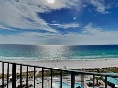 a view of the beach from the balcony of a condo at Edgewater Tower I #1203 in Panama City Beach