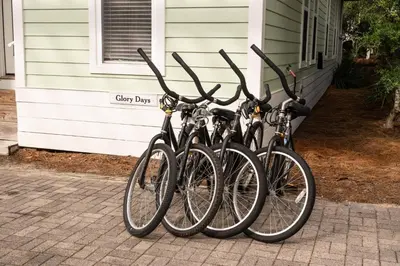 a group of bikes parked outside of a house at Glory Days 30A - Pool, Bikes & Close Beach Access in Inlet Beach