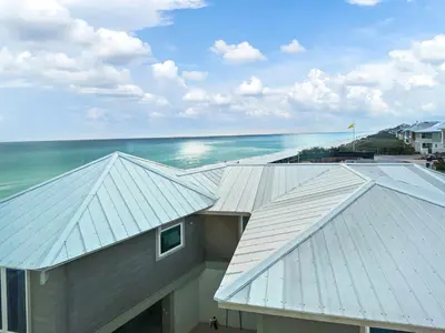 a view of the beach from the roof of a building at 224 Winston Ln l 4 Bikes Included l Beachfront with Amazing view l Community Pool in Inlet Beach