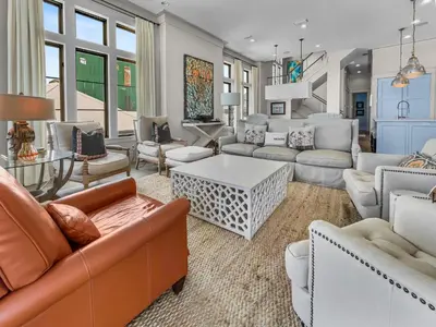 a large living room with couches and a table at 224 Winston Ln l 4 Bikes Included l Beachfront with Amazing view l Community Pool in Inlet Beach