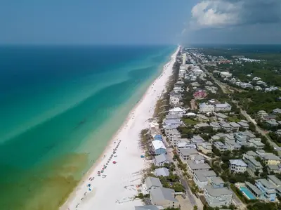 an aerial view of a beach with houses and the ocean at Absolutely Paradise II l Heated 5000 sqft resort style pool l Walk to many restaurants in Santa Rosa Beach