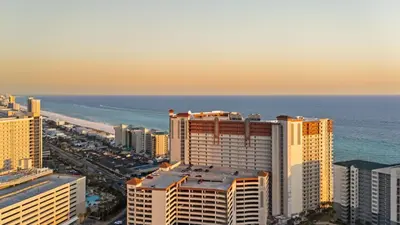 an aerial view of a city and the ocean at Beachfront Condo Oceanview Balcony Lagoon Pool Thomas Dr 2308 by AvantStay in Panama City Beach