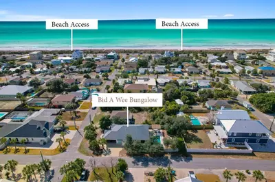 a view of a residential suburb with the beach and the ocean at Bid A Wee Bungalow l Outdoor living l Private Pool & Private Beach Access l EV Charging in Panama City Beach