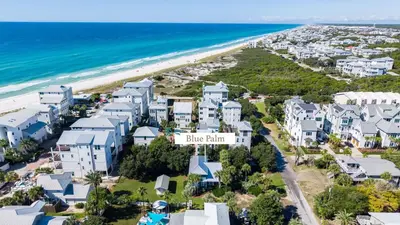 an aerial view of a resort with the beach at Blue Palm l Minutes to Sandy White Beach l Bike to Rosemary Beach in Inlet Beach