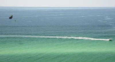an aerial view of a boat in the water at Origins at Seahaven 1429 in Panama City Beach
