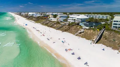 an overhead view of a beach with people on it at Dream On l Beachfront l Golf cart and 4 Bikes Included l Gulf Front Private Pool in Seacrest