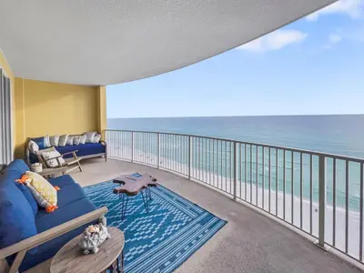 a living room with a view of the ocean at Emerald Isle l Beachfront l Amazing beach views l Heated Community Pool l Fitness center in Panama City Beach