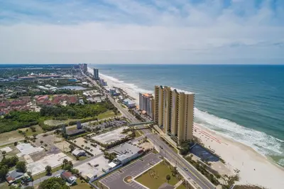an aerial view of the beach and the ocean at Emerald Isle l Beachfront l Amazing beach views l Heated Community Pool l Fitness center in Panama City Beach
