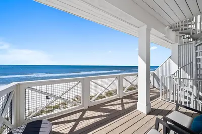 a balcony with a view of the ocean at Joy by the Sea l Private heatable pool l Beach Front l Family Activities nearby in Panama City Beach