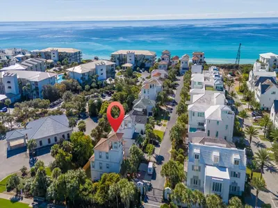 an aerial view of a residential neighbourhood with a red balloon at The Mermaid in Rosemary Beach