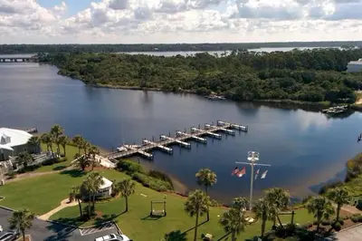 an aerial view of a lake with a dock at Sunshine at PP A-914 in Panama City Beach