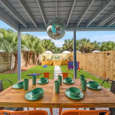 Disco Dolphin – Your Funky Beachside Haven in PCB