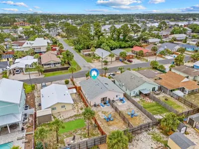 an aerial view of a small town with houses at Sunset Retreat TOO - 2BR - 4 Min Walk to Beach in Panama City Beach
