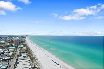 an aerial view of a beach and the ocean at 5 Min Walk to Sand - King Bed - Private Yard in Panama City Beach