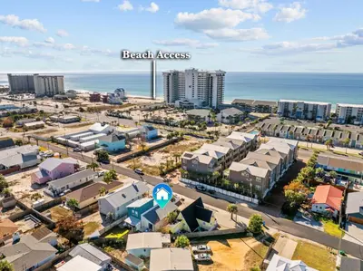 an aerial view of a city with the ocean at 5 Min Walk to Sand - King Bed - Private Yard in Panama City Beach