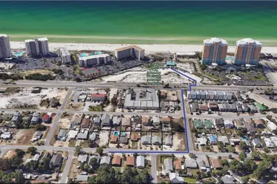 an aerial view of a city with buildings and the beach at Sunset Dreams - King Bed - 5 Min Walk to Beach in Panama City Beach
