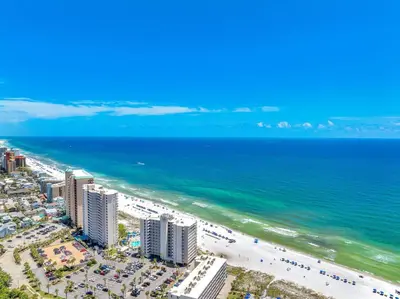 an aerial view of the beach and the ocean at Sunset Dreams - King Bed - 5 Min Walk to Beach in Panama City Beach