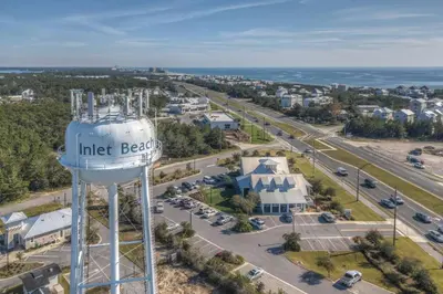 an aerial view of a water tower with the words litter beach at Sunlit Sands in Inlet Beach