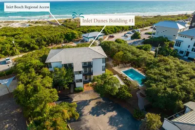an aerial view of a house and the beach at Inlet Dunes 105 l Community Pool l Across From The Beach in Inlet Beach