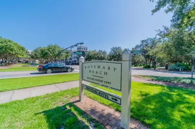 a sign for a park in front of a street at Inlet Sands 204 l 1 min walk to beach l Community Pool l Bike to Rosemary in Inlet Beach