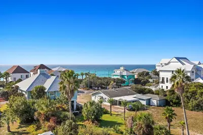 an aerial view of houses and the ocean at Pomp in Paradise in Inlet Beach