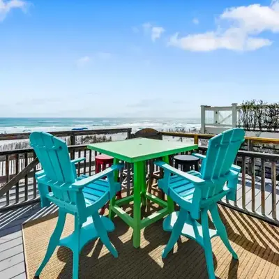Leeward II 3 l Beachfront Condo l Large first level deck with steps down to sand