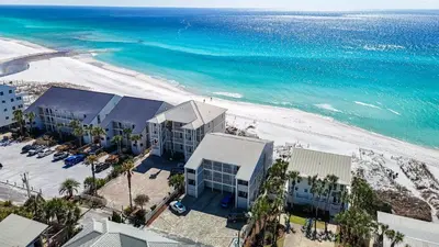 an aerial view of the beach and the ocean at Leeward II 8 Sand Angels l Beachfront Condo l Newly Renovated l Beach Towels in Seagrove Beach